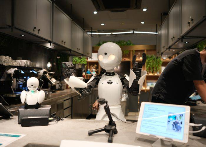 The till area at the DAWN Avatar Robot Cafe, where a robot is waiting to take your payment.